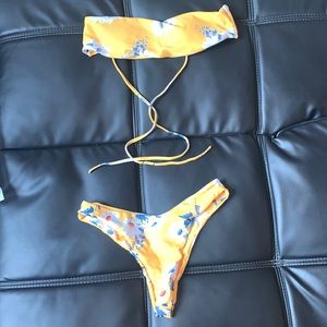 Mustard yellow bathing suit in size small.